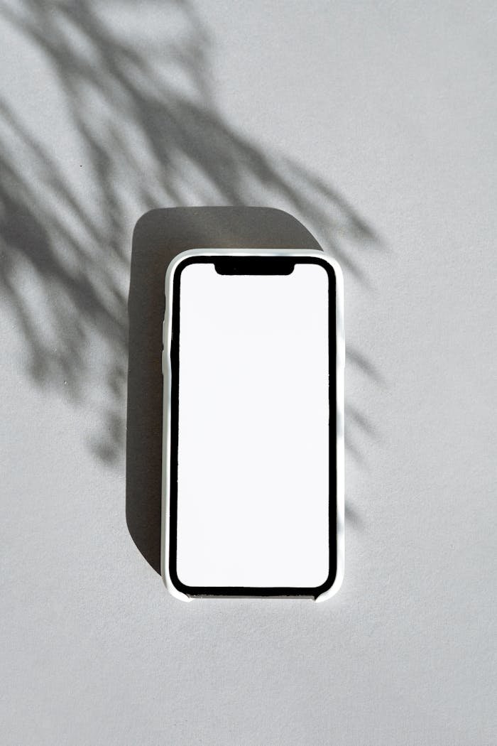 White Smartphone on Gray Table